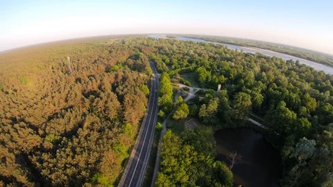 Flight over highway and forest Stock Footage 89454447