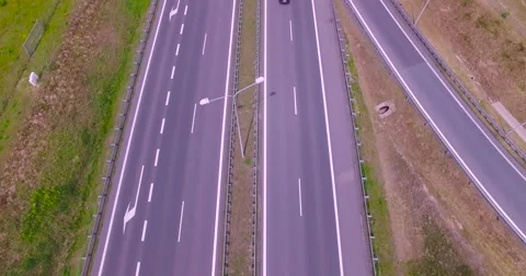 Flight over highway crossing Stock Footage 65600442
