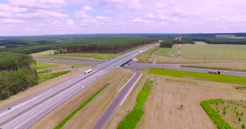 Flight over highway crossing Stock Footage 65601415