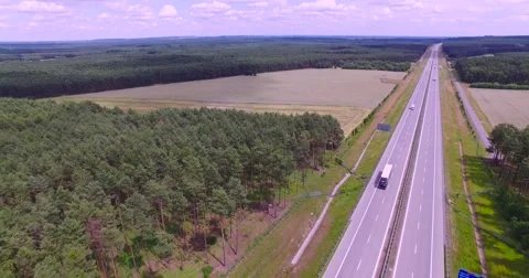 Flight over highway crossing Stock Footage 65601550