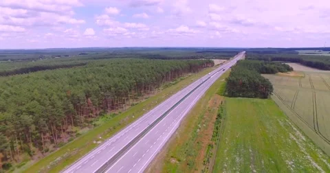 Flight over highway crossing Stock Footage 65601848