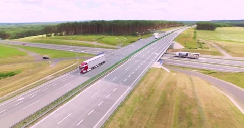 Flight over highway crossing Stock Footage 65602760