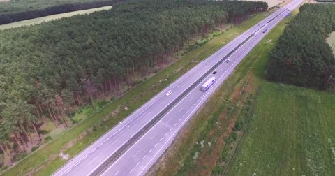 Flight over highway crossing Stock Footage 65602944