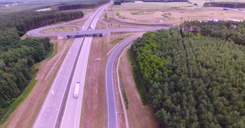 Flight over highway crossing Stock Footage 65604887