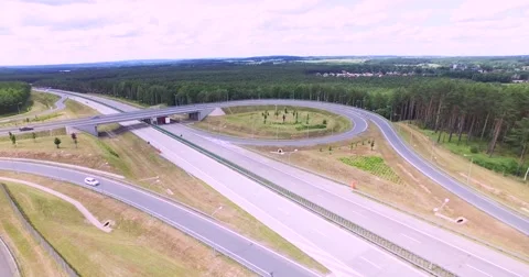 Flight over highway crossing Stock Footage 65605503