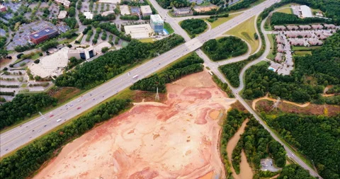 Flight Over Highway, Development, Tree Clearing and Construction Stock Footage 139948528