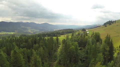 Flight over hill and wood in mountains. Aerial  shot  Stock Footage 43247853
