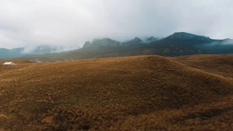 Flight over the hills in the fall Stock Footage 105671386