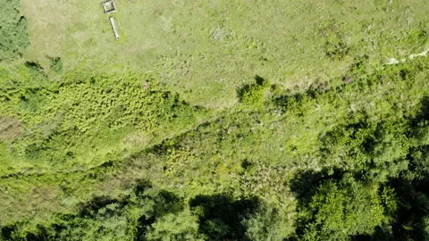Flight over a house in small rural village Stockbeeldmateriaal 137801474