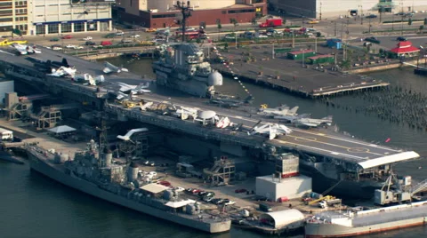 Flight over Hudson River and USS Intrepid for view of Manhattan. Shot in 2003. Stock Footage 59522007