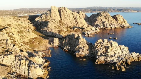 Flight over huge sea cliffs with fantasy shapes Stock Footage 128463368