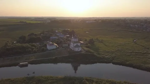 Flight over the Ilinsky meadow and the church of Elijah the Prophet in Suzdal Stock Footage 94080983