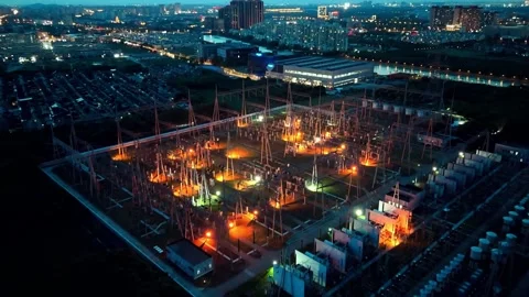 Flight Over Illuminated Electrical Substation at Night in China Stock Footage 342145502