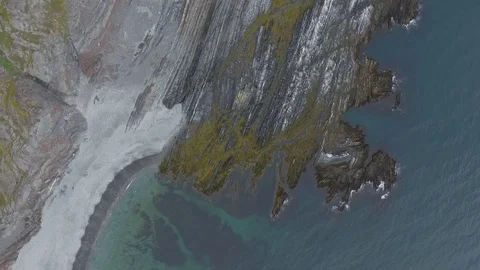 Flight over the impressive and beautiful wild coast of the Barents Sea. Video stock 83690866