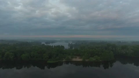 Flight over the islands on a large river at dawn Video stock 63503682