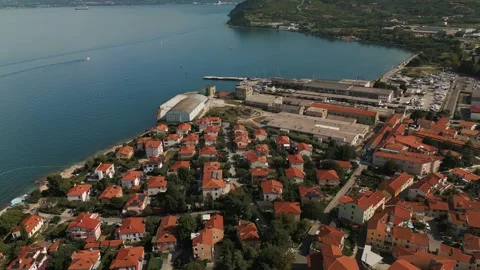 Flight over Izola to the shipyard Stock Footage 257611750