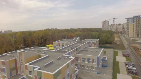 Flight over kindergarten.Helicopter Stock Footage 101578538