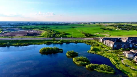 Flight over the lake in the city Stock Footage 305197979