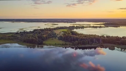 Flight over the lake in the evening Video stock 111988339