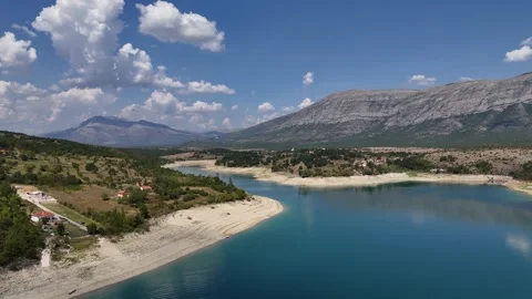 Flight over the lake Peruca 1 Video stock 285933069