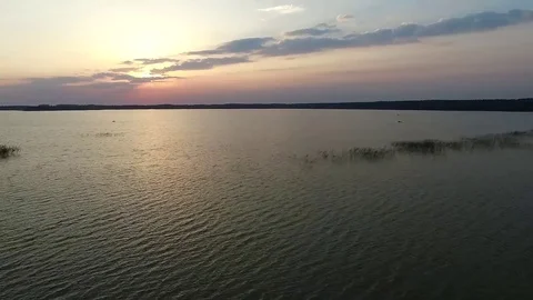 Flight over the lake sundown Stock Footage 99118844