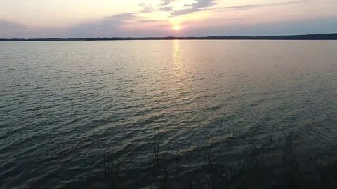 Flight over the lake sundown Stock Footage 99118853
