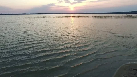 Flight over the lake sundown Stock Footage 99118881