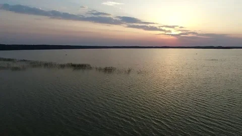 Flight over the lake sundown Stock Footage 99118898