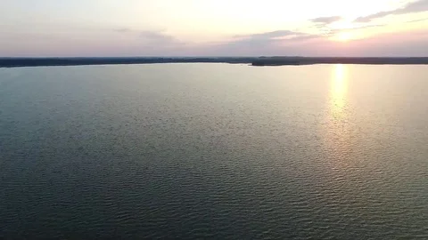 Flight over the lake sundown Stock Footage 99118985