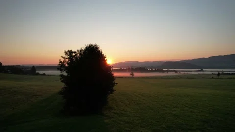 Flight over Lake Trumersee  in Austria at sunrise Stock Footage 161012093