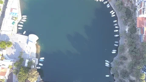 Flight over lake Voulisma Stock Footage