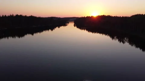 Flight over lakes and forests in Karelia in Russiaat sunset. Stock-Footage 156537001