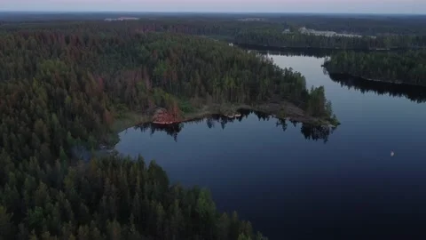 Flight over lakes and forests in Karelia in Russiaat sunset. Stock-Footage 156537584