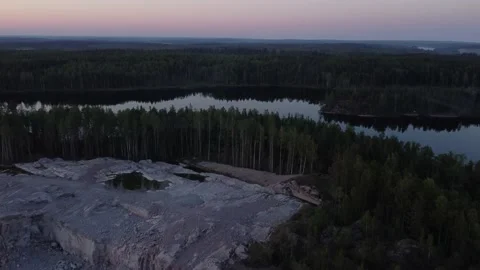 Flight over lakes and forests in Karelia in Russiaat sunset. Stock-Footage 156537717