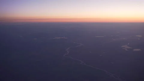 Flight over the land at sunset. the view from the plane Stock Footage 95059598