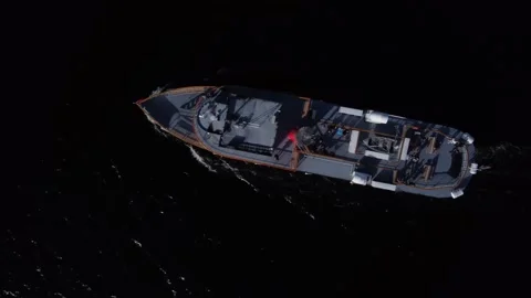 Flight over large boat on dark water Stock Footage 255404080