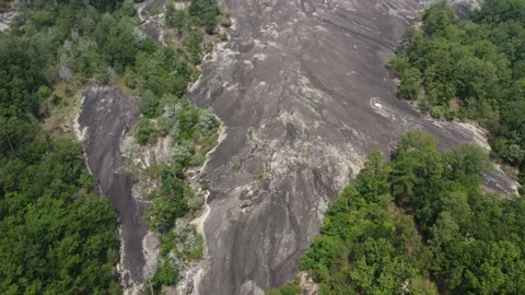 Flight over large expanse of stony plateau at 40 Acre Rock in Kershaw, SC Stock Footage 246758920