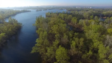 Flight over a large river during the spring flood Video stock 88946220