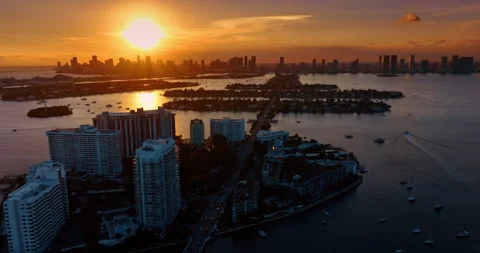 Flight over the man-made islands in Brickell Key at golden hour. Stock Footage 324822325