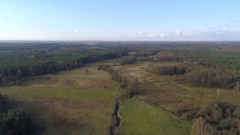 Flight over the meandering river Stock Footage 123704268