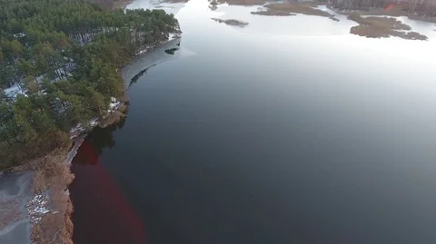 Flight over mirror lake on a winter day Stock Footage 71798539