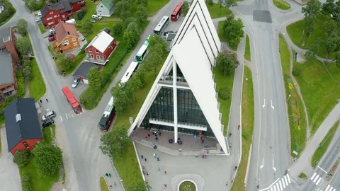 Flight over modern Arctic Cathedral in Tromso Stock Footage 129446227