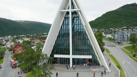 Flight over modern Arctic Cathedral in Tromso Stock Footage 129446316