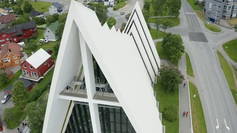 Flight over modern Arctic Cathedral in Tromso Stock Footage 129446357