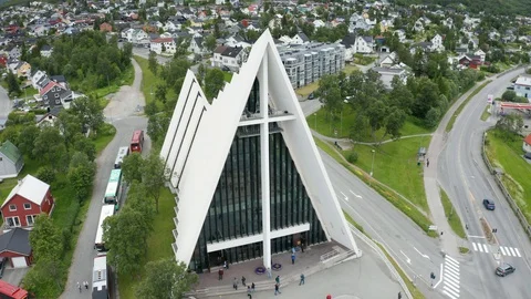Flight over modern Arctic Cathedral in Tromso Stock Footage 129446532