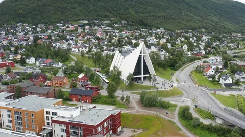 Flight over modern Arctic Cathedral in Tromso Stock Footage 129446568