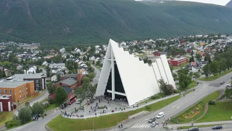 Flight over modern Arctic Cathedral in Tromso Stock Footage 129446837