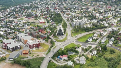 Flight over modern Arctic Cathedral in Tromso Stock Footage 129447024