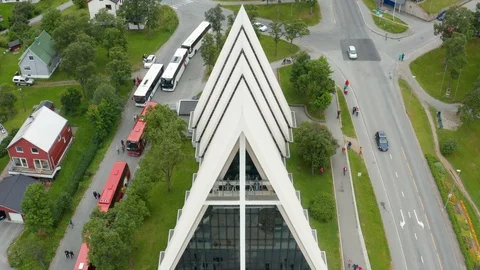 Flight over modern Arctic Cathedral in Tromso Stock Footage 129448070