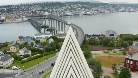 Flight over modern Arctic Cathedral in Tromso Stock Footage 129449515